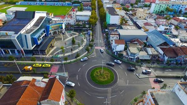Aerial view of Kamëz urban roundabout and traffic infrastructure